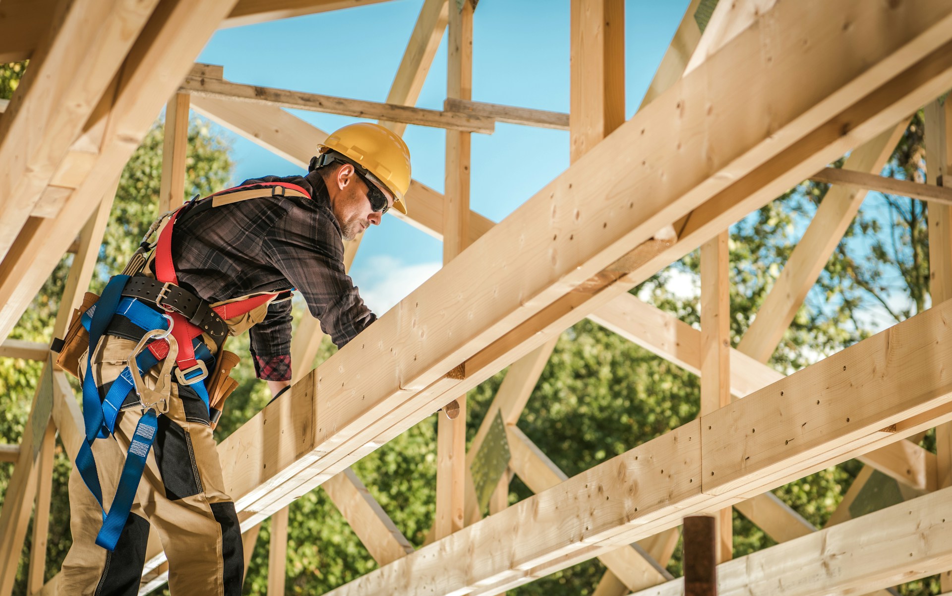 Construction professional using a tablet on a job site
